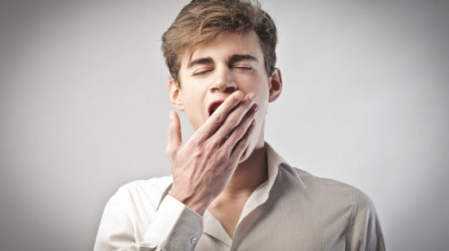depositphotos_10515779-stock-photo-young-man-yawning